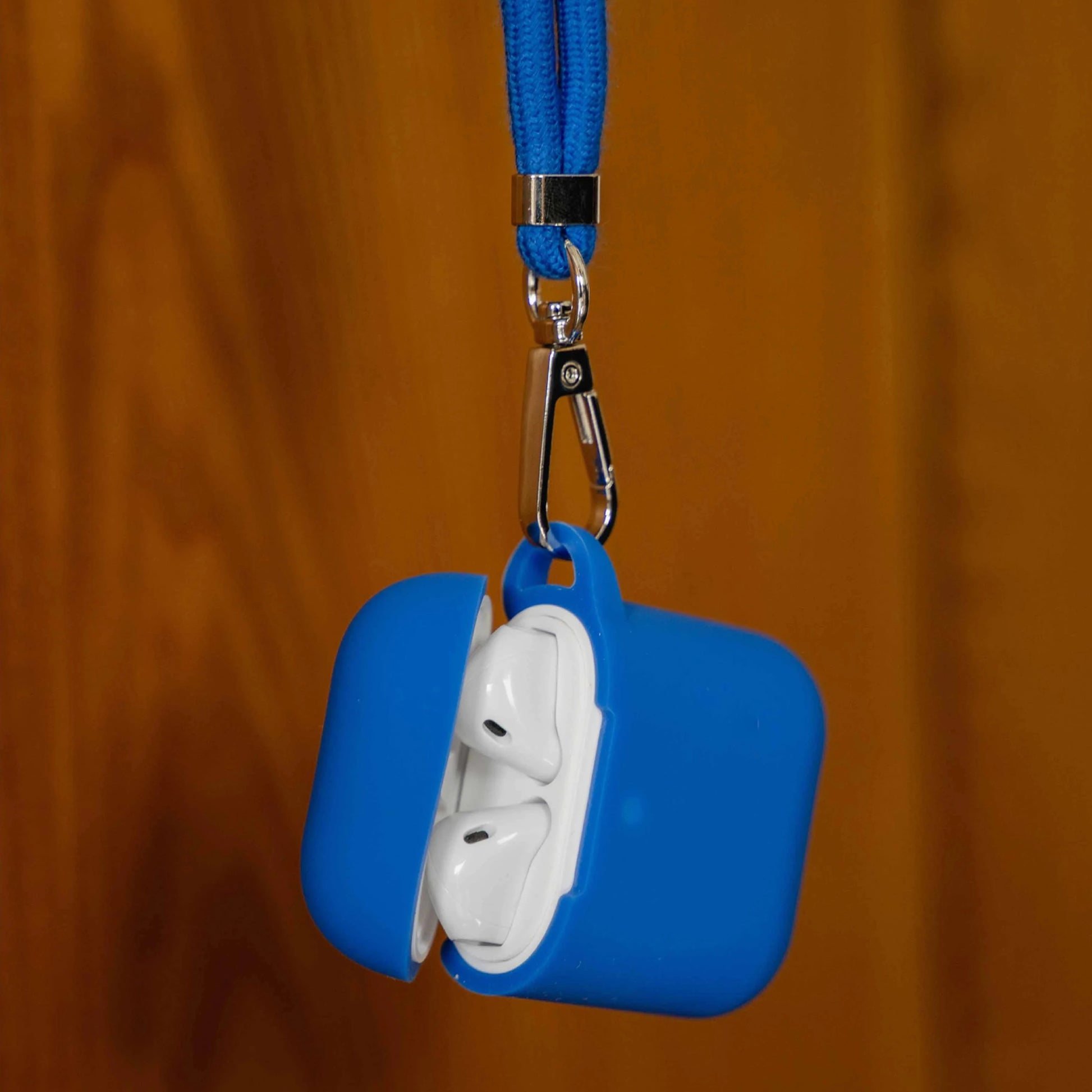 Crossbody AirPods Hülle in knalligen Farben mit Seil in blau