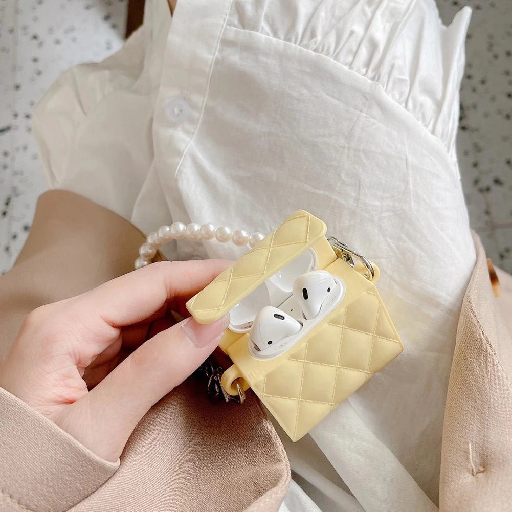 Modische AirPods Hülle als Handtasche Design mit Perlenkette in gelb